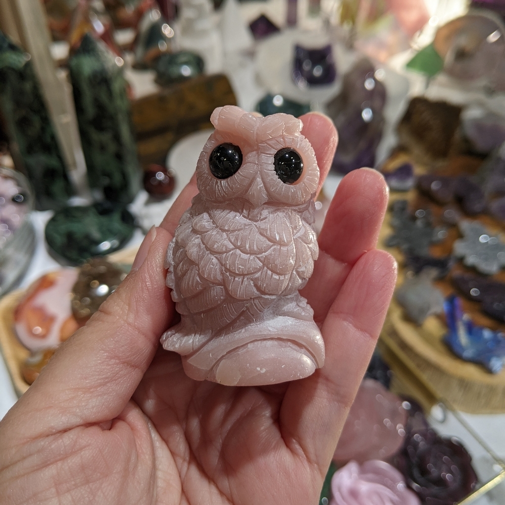 Pink opal owl carving